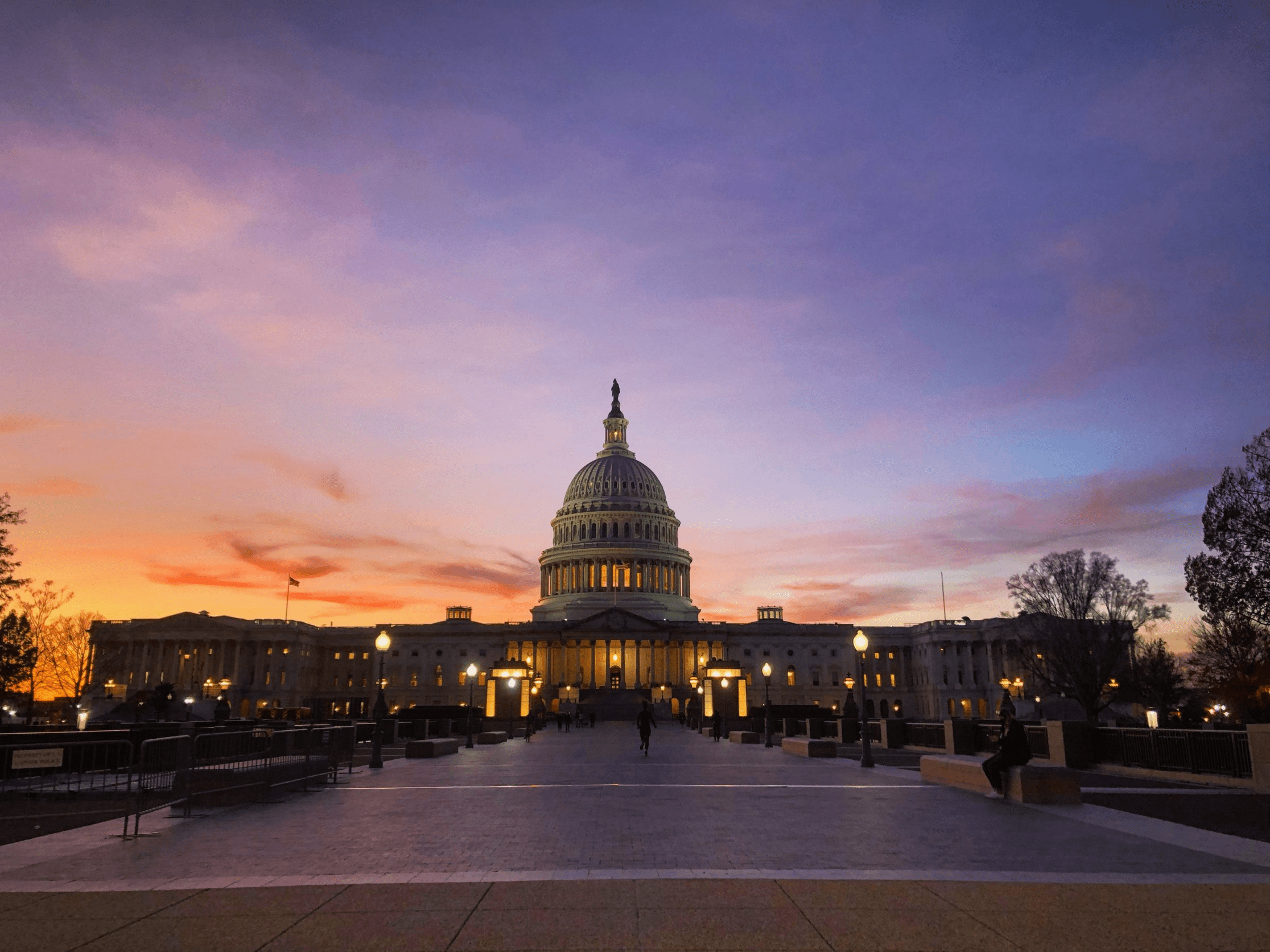 A picture of the United States Capitol at sunset.